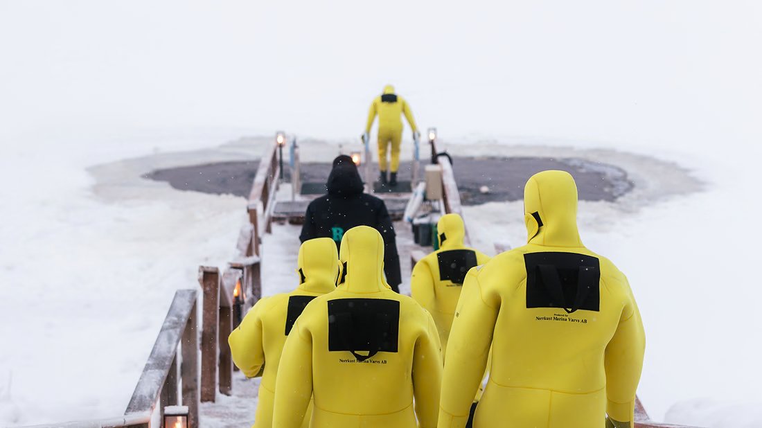 Guests walking to the ice hole