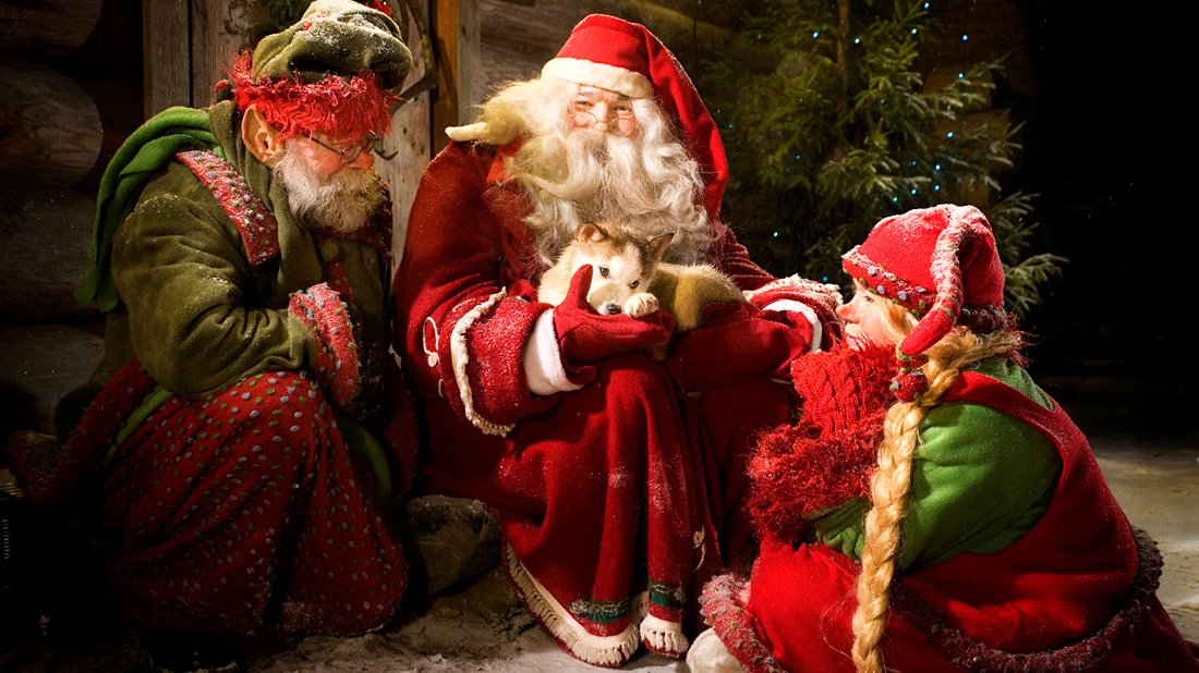 Der Weihnachtsmann mit einem Weihnachtselfen